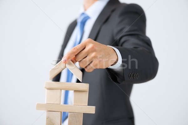 Businessman making tower Stock photo © adam121