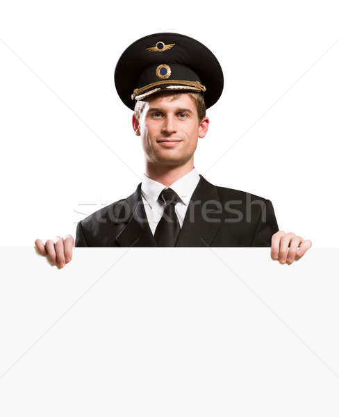 pilot in the form of holding a blank banner Stock photo © adam121