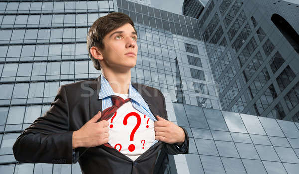 Stock photo: businessman breaks the shirt