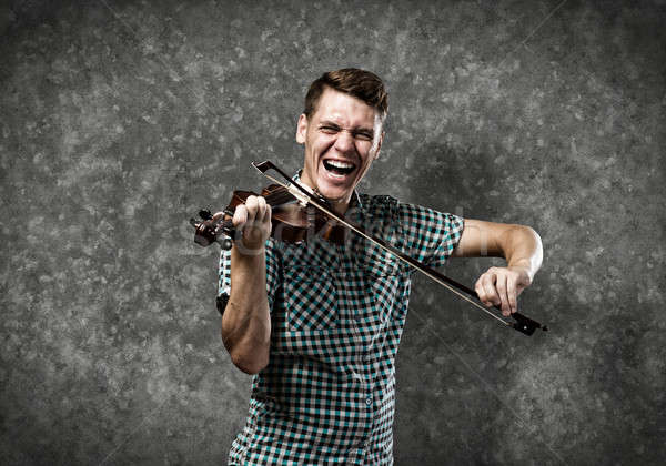 Musician playing violin Stock photo © adam121