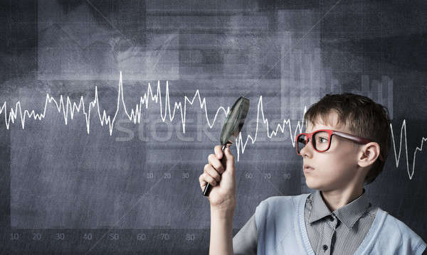 Stockfoto: Nieuwsgierig · schooljongen · vergrootglas · cute · jongen · naar