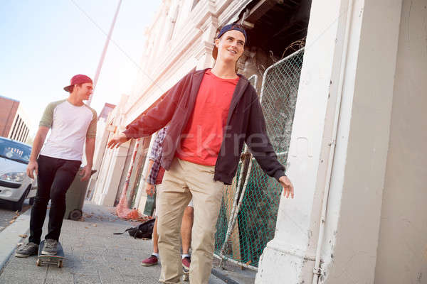 Guys skateboarders in street Stock photo © adam121