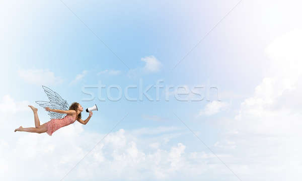 Wolna pośpieszny młoda kobieta megafon pływające wysoki Zdjęcia stock © adam121