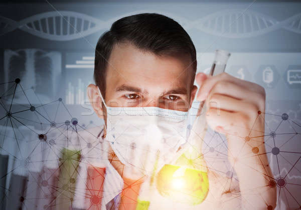 Portrait of concentrated male scientist working with reagents in laboratory Stock photo © adam121