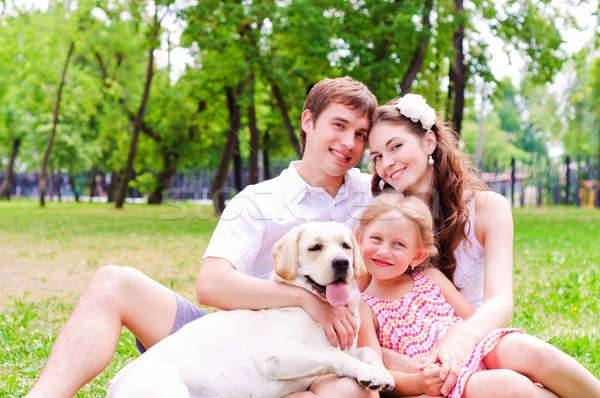 Boldog fiatal család labrador pihen park Stock fotó © adam121