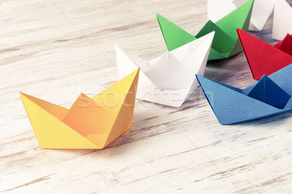 Business leadership concept with white and color paper boats on  Stock photo © adam121