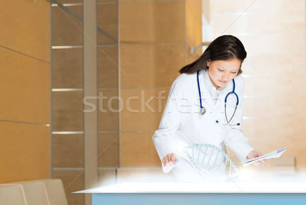 young woman doing research Stock photo © adam121