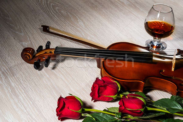 Violin, rose, glass of champagne and music books Stock photo © adam121