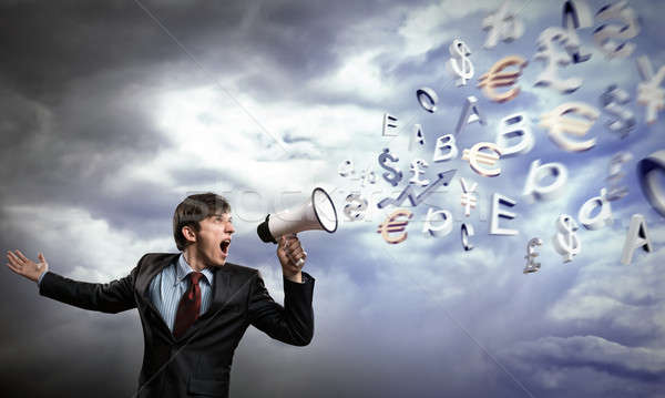 businessman shouting into a megaphone Stock photo © adam121