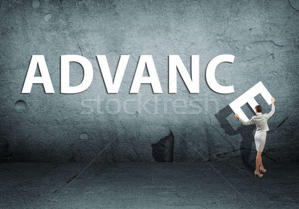 young businesswoman adds advance word Stock photo © adam121