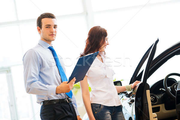 經銷商 汽車 推銷員 年輕的女孩 商業照片 © adam121