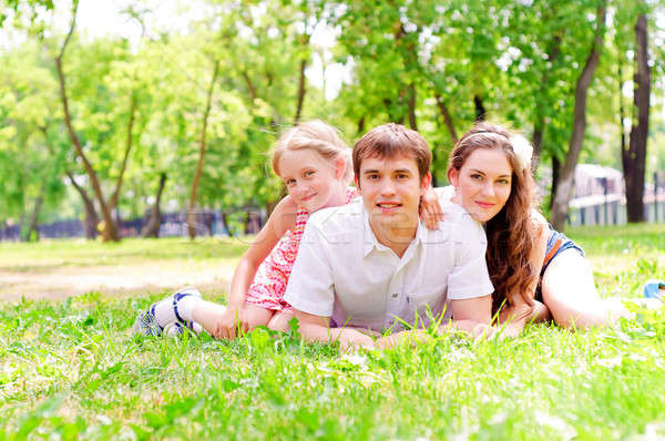 Family lying in the park Stock photo © adam121