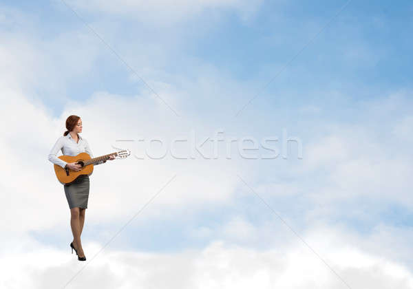 Businesswoman play guitar Stock photo © adam121