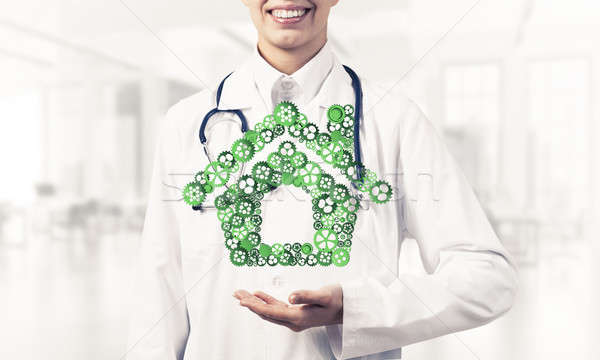 Simbol pagina de pornire mână femeie medic Imagine de stoc © adam121