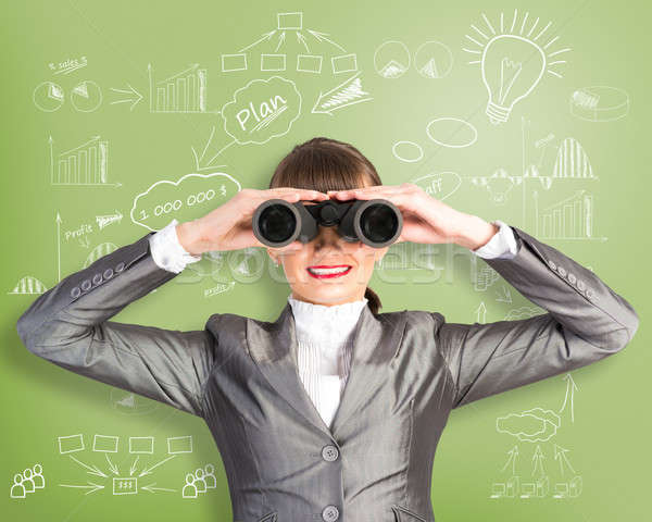 business woman looking through binoculars Stock photo © adam121