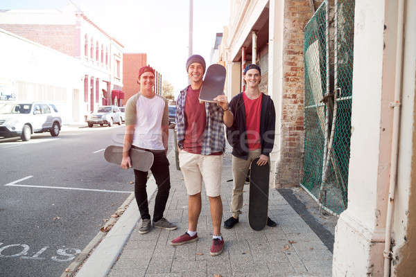 Guys skateboarders in street Stock photo © adam121