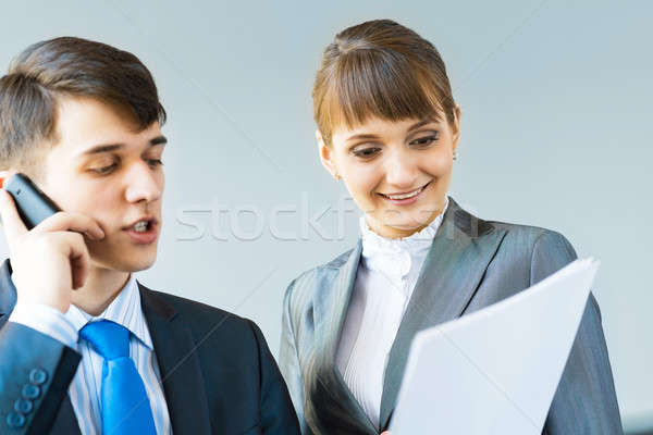 two business partners discussing reports Stock photo © adam121