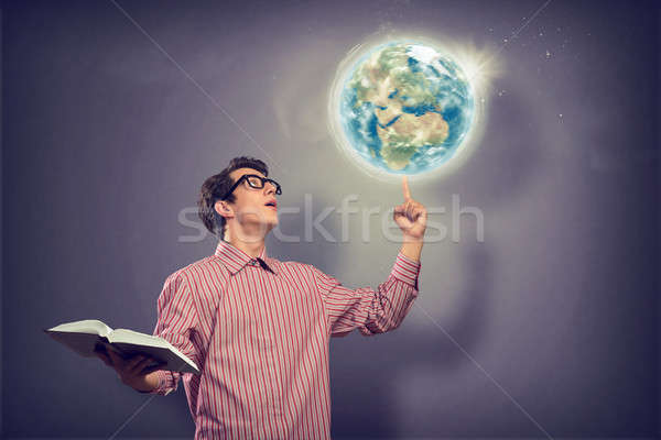young man with a book thinks Stock photo © adam121