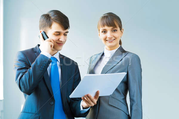 two business partners discussing reports Stock photo © adam121