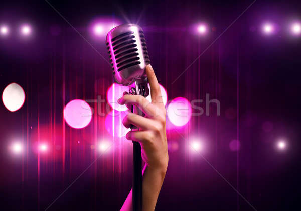 Popular cantante femenino mano borroso Foto stock © adam121