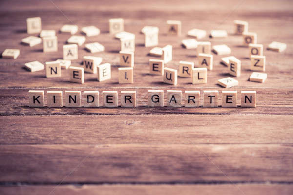 wooden elements with letter collected to word kinder garten Stock photo © adam121