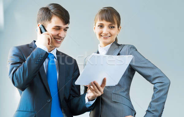 two business partners discussing reports Stock photo © adam121