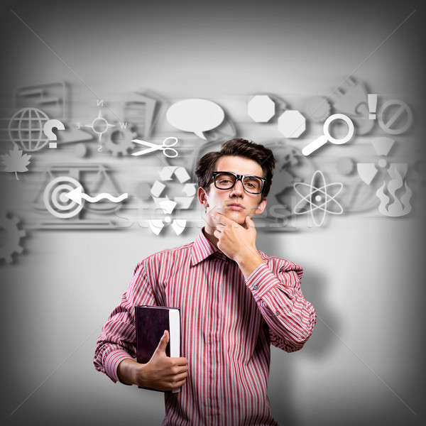 young man scientist with glasses thinking Stock photo © adam121