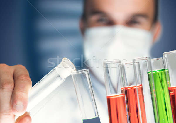 Portrait of concentrated male scientist working with reagents in laboratory Stock photo © adam121