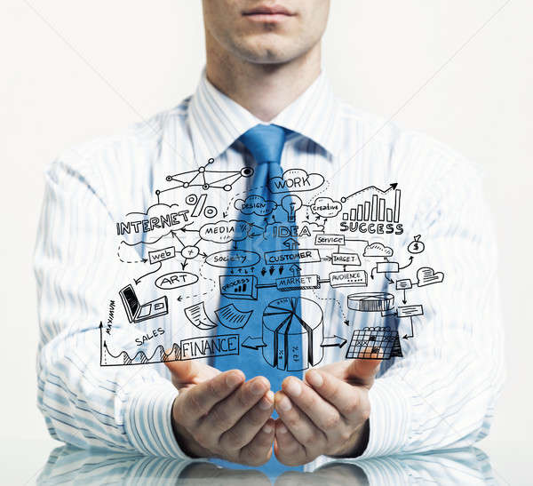 Businessman demonstrate his business plan Stock photo © adam121