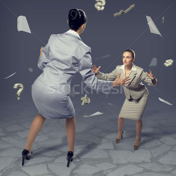 Stock photo: two businesswomen fighting as sumoist