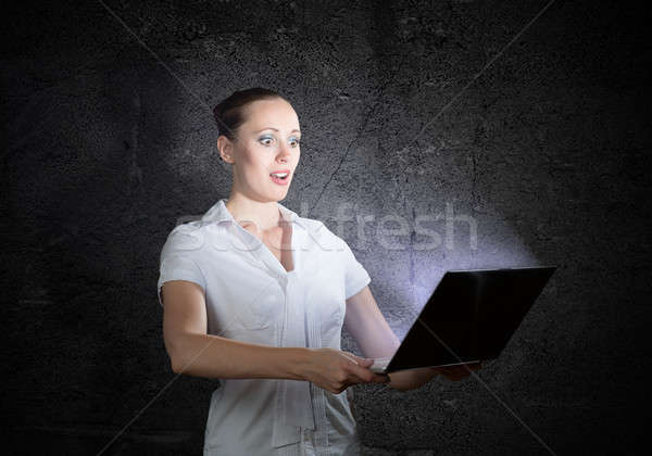 young attractive woman holding a laptop Stock photo © adam121