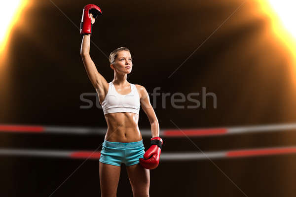Foto d'archivio: Femminile · boxer · vincitore · raggi · luci
