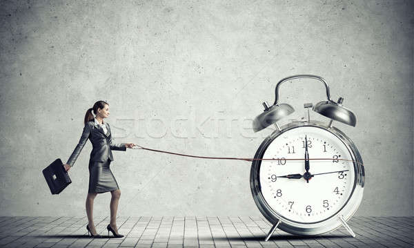 Woman controlling time Stock photo © adam121