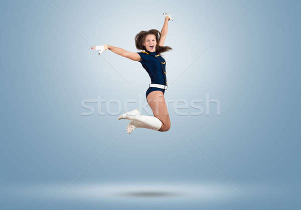Cheerleader fille jeunes belle souriant sautant Photo stock © adam121