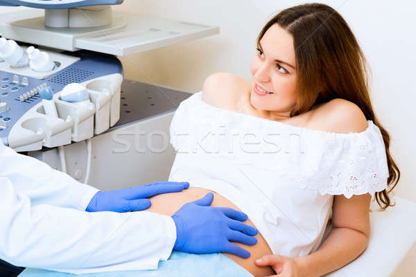 Zwangere vrouw receptie arts jonge aantrekkelijk gezondheid Stockfoto © adam121