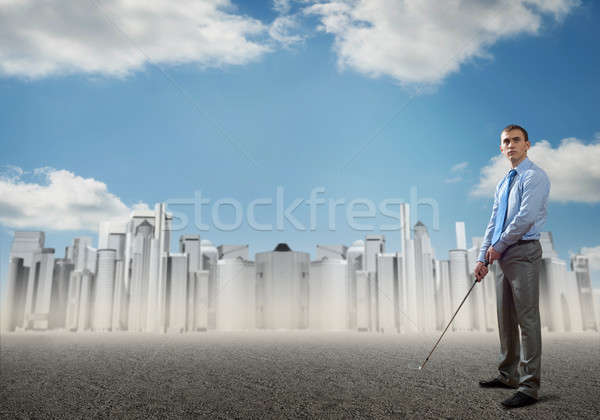 Stockfoto: Zakenman · spelen · golf · geslaagd · wolkenkrabber · kantoorgebouwen