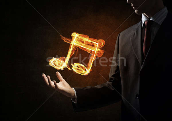 Tűz zene ikon közelkép személy kéz Stock fotó © adam121