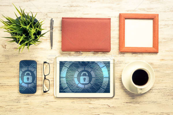 Web security and technology concept with tablet pc on wooden tab Stock photo © adam121
