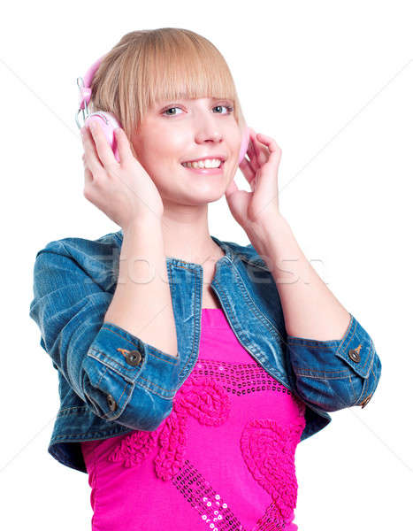 Young attractive woman listing to music Stock photo © adam121