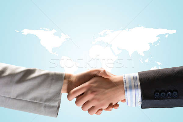 Two businessmen shaking hands Stock photo © adam121