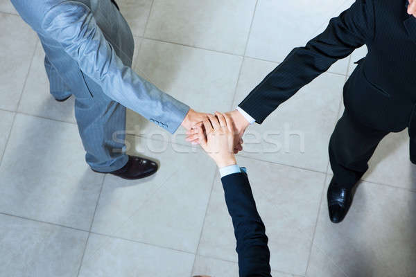 Symbol zespołowej zespołu trzy biznesmenów ręce Zdjęcia stock © adam121
