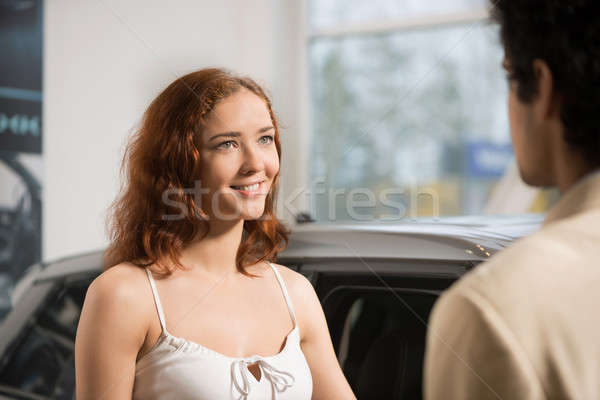 Verkoop jonge vrouw auto show kamer Stockfoto © adam121