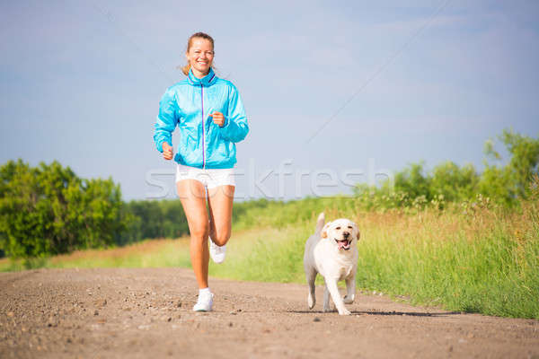 Stock photo: young woman running