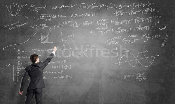 Man writing on blackboard Stock photo © adam121
