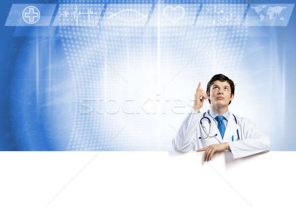 Doctor with banner Stock photo © adam121