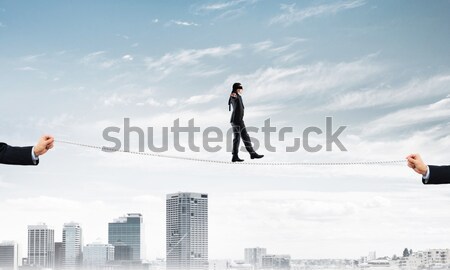 Stock photo: Palm supporting businessman