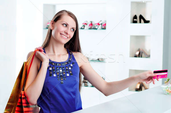 woman at shopping checkout paying credit card Stock photo © adam121