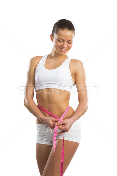 young athletic woman measuring waist Stock photo © adam121