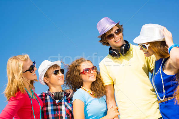 group of young people wearing sunglasses and hat Stock photo © adam121