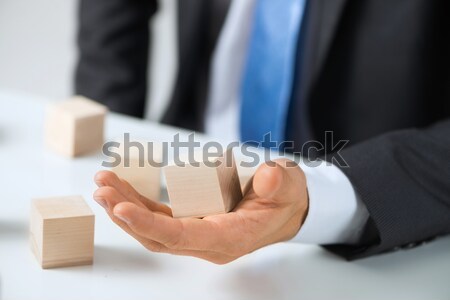 Businessman making tower Stock photo © adam121